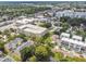 Aerial view of a neighborhood with modern townhouses and a mix of architectural styles at 31 W Harding St, Orlando, FL 32806