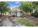 Back exterior of the home with a wooden ramp at 31 W Harding St, Orlando, FL 32806