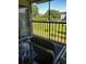 Screened balcony with seating and view of green space at 6182 Willowpointe # B201, Orlando, FL 32822