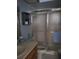 Bathroom with shower/tub combo and wood vanity at 6182 Willowpointe # B201, Orlando, FL 32822
