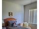 Condo bedroom with twin bed and adjacent seating at 6182 Willowpointe # B201, Orlando, FL 32822