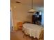 Dining area with oval table, chairs, and light-colored tablecloth at 6182 Willowpointe # B201, Orlando, FL 32822