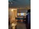 Open dining area with view of kitchen and living room at 6182 Willowpointe # B201, Orlando, FL 32822