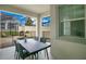 Patio with outdoor dining set and pool view at 1552 Plunker Dr, Davenport, FL 33896