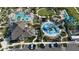 Aerial view of community pool, water park, and clubhouse at 1552 Plunker Dr, Davenport, FL 33896