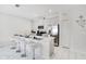 Modern kitchen with white quartz countertops and stainless steel appliances at 1552 Plunker Dr, Davenport, FL 33896