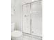 Bathroom with a walk-in shower and toilet at 1552 Plunker Dr, Davenport, FL 33896