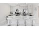 Modern kitchen with white quartz countertops and stainless steel appliances at 1552 Plunker Dr, Davenport, FL 33896