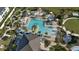 Large community pool with surrounding lounge area and landscaping at 1552 Plunker Dr, Davenport, FL 33896