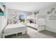 bedroom with full-size bed, bunk beds, and Mickey Mouse decor at 1552 Plunker Dr, Davenport, FL 33896