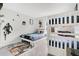 Themed bedroom with full-size bed, bunk beds, and Star Wars decor at 1552 Plunker Dr, Davenport, FL 33896