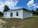 Modern house exterior with a white and black color scheme, showcasing the back of the house at 15096 Sw 51St Ave, Ocala, FL 34473