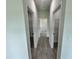 Hallway with two bedroom doors and closets at 15096 Sw 51St Ave, Ocala, FL 34473