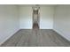 Spacious bedroom with access to a hallway at 15096 Sw 51St Ave, Ocala, FL 34473