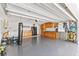Organized garage with overhead storage and workbenches at 7220 Grace Rd, Orlando, FL 32819