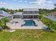 Aerial view of the house, pool, and backyard at 7220 Grace Rd, Orlando, FL 32819