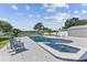 Relaxing pool and spa area with lake view at 7220 Grace Rd, Orlando, FL 32819