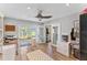 Bright home office with built-in desk and hardwood floors at 7220 Grace Rd, Orlando, FL 32819