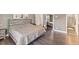 Main bedroom with large bed and walk-in closet at 7220 Grace Rd, Orlando, FL 32819