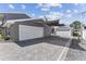Spacious two-car garage with paver driveway at 7220 Grace Rd, Orlando, FL 32819