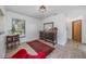 Spacious living room with leather couches, wood ceiling, and large window overlooking tranquil scenery at 3355 Scarlet Dr, Sanford, FL 32773