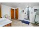 Spa-like bathroom with double shower heads and marble tile at 3355 Scarlet Dr, Sanford, FL 32773