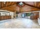 Vaulted ceiling living room with stone fireplace and access to deck at 3355 Scarlet Dr, Sanford, FL 32773