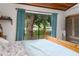 Main bedroom with water view from sliding glass doors at 3355 Scarlet Dr, Sanford, FL 32773