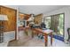 Home office with stone fireplace and view of backyard at 3355 Scarlet Dr, Sanford, FL 32773