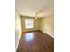 Bedroom with wood floors and ceiling fan at 1059 S Hiawassee Rd # 1824, Orlando, FL 32835