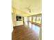 Bright living room with wood floors and kitchen bar at 1059 S Hiawassee Rd # 1824, Orlando, FL 32835