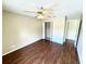 Bright bedroom with wood floors and walk-in closet at 1059 S Hiawassee Rd # 1824, Orlando, FL 32835