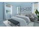 Spacious bedroom with light walls and stylish decor at 1146 Atlantic Ave, Fruitland Park, FL 34731