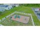 Community playground with play structures and safety surfacing at 1146 Atlantic Ave, Fruitland Park, FL 34731