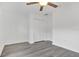 Bedroom with double door closet and ceiling fan at 297 Malauka Run, Ocklawaha, FL 32179