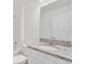 Bathroom with single vanity and granite countertop at 297 Malauka Run, Ocklawaha, FL 32179