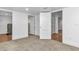 Hallway with doors leading to different rooms at 448 Nw 18Th Ave, Ocala, FL 34475