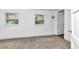 Spacious bedroom with neutral carpeting and ample natural light at 448 Nw 18Th Ave, Ocala, FL 34475