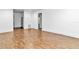 Bright living room with light wood laminate flooring at 448 Nw 18Th Ave, Ocala, FL 34475