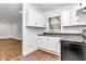 Efficient kitchen with white cabinets and modern appliances at 448 Nw 18Th Ave, Ocala, FL 34475
