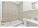 Updated bathroom with neutral tile and vanity at 448 Nw 18Th Ave, Ocala, FL 34475