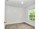 Simple bedroom with carpeted floor and a window at 448 Nw 18Th Ave, Ocala, FL 34475