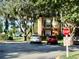 Parking area with designated spots and signage at 4146 Versailles Dr # 4146D, Orlando, FL 32808