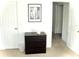 Simple bedroom with a dresser, offering great storage options at 4146 Versailles Dr # 4146D, Orlando, FL 32808
