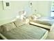 Well-lit bedroom with two double beds and neutral decor at 4146 Versailles Dr # 4146D, Orlando, FL 32808