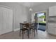 Eat-in kitchen with sliding glass doors leading to backyard at 370 Routh Ave, New Smyrna Beach, FL 32168