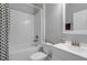 Clean bathroom with white vanity and bathtub at 370 Routh Ave, New Smyrna Beach, FL 32168