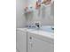 Laundry room with washer, dryer, and shelving at 370 Routh Ave, New Smyrna Beach, FL 32168