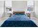 Spacious bedroom with large windows and two nightstands at 370 Routh Ave, New Smyrna Beach, FL 32168