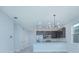 Modern kitchen with stainless steel appliances and granite countertops at 1146 Atlantic Ave, Fruitland Park, FL 34731